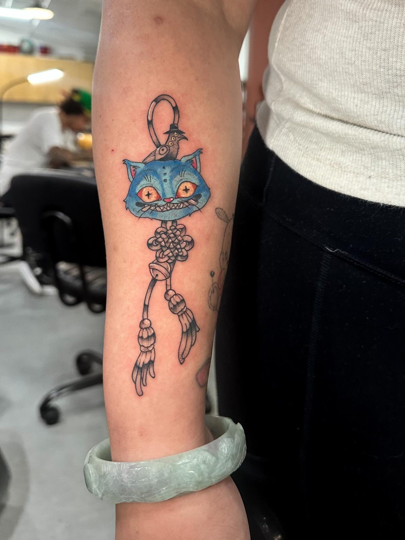 Hxllcat tattoo work at Beach Park Tattoo