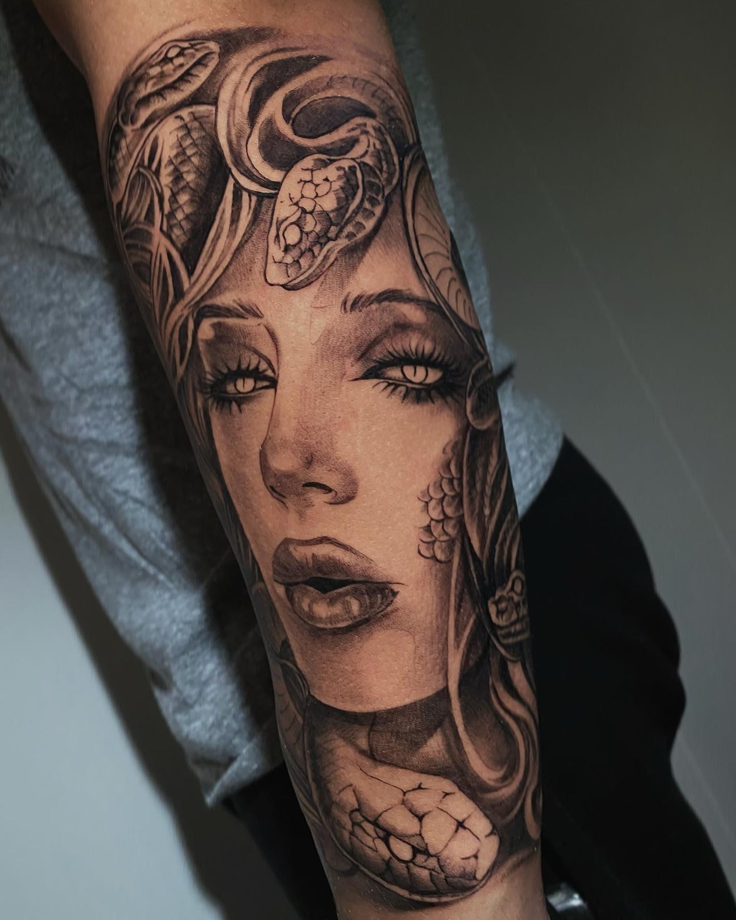 Black and gray Medusa portrait tattoo by Javi at Beach Park Tattoo