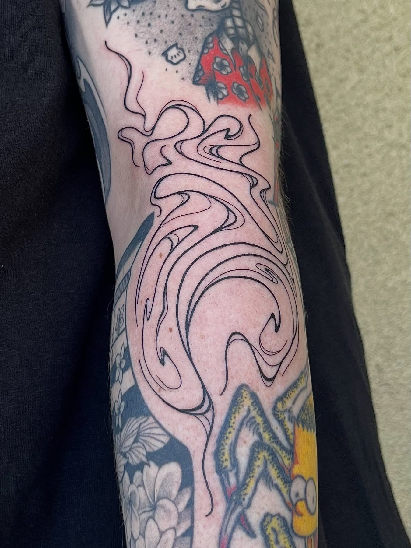 LayerLayer tattoo work at Beach Park Tattoo