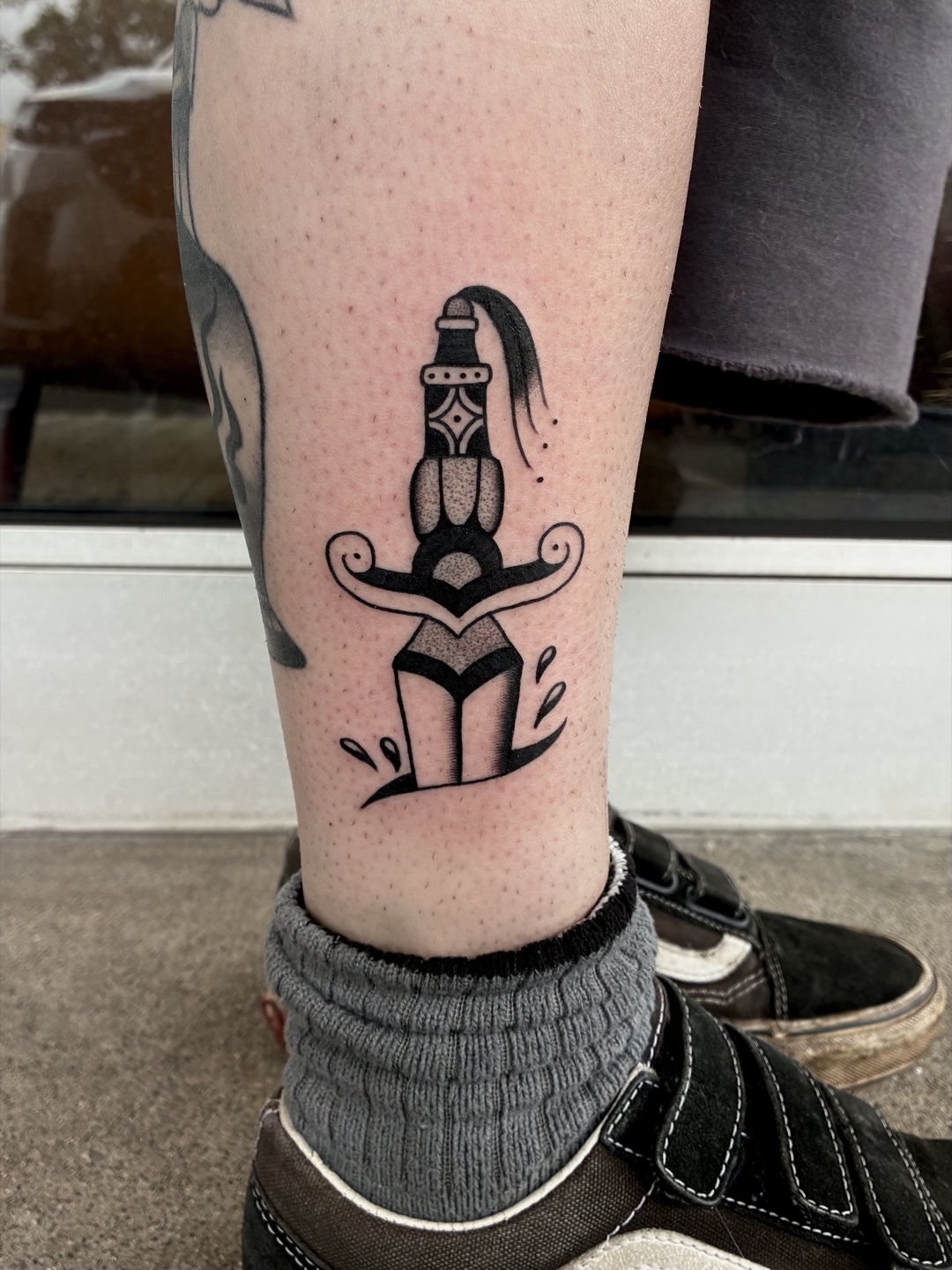 Lily tattoo work at Beach Park Tattoo