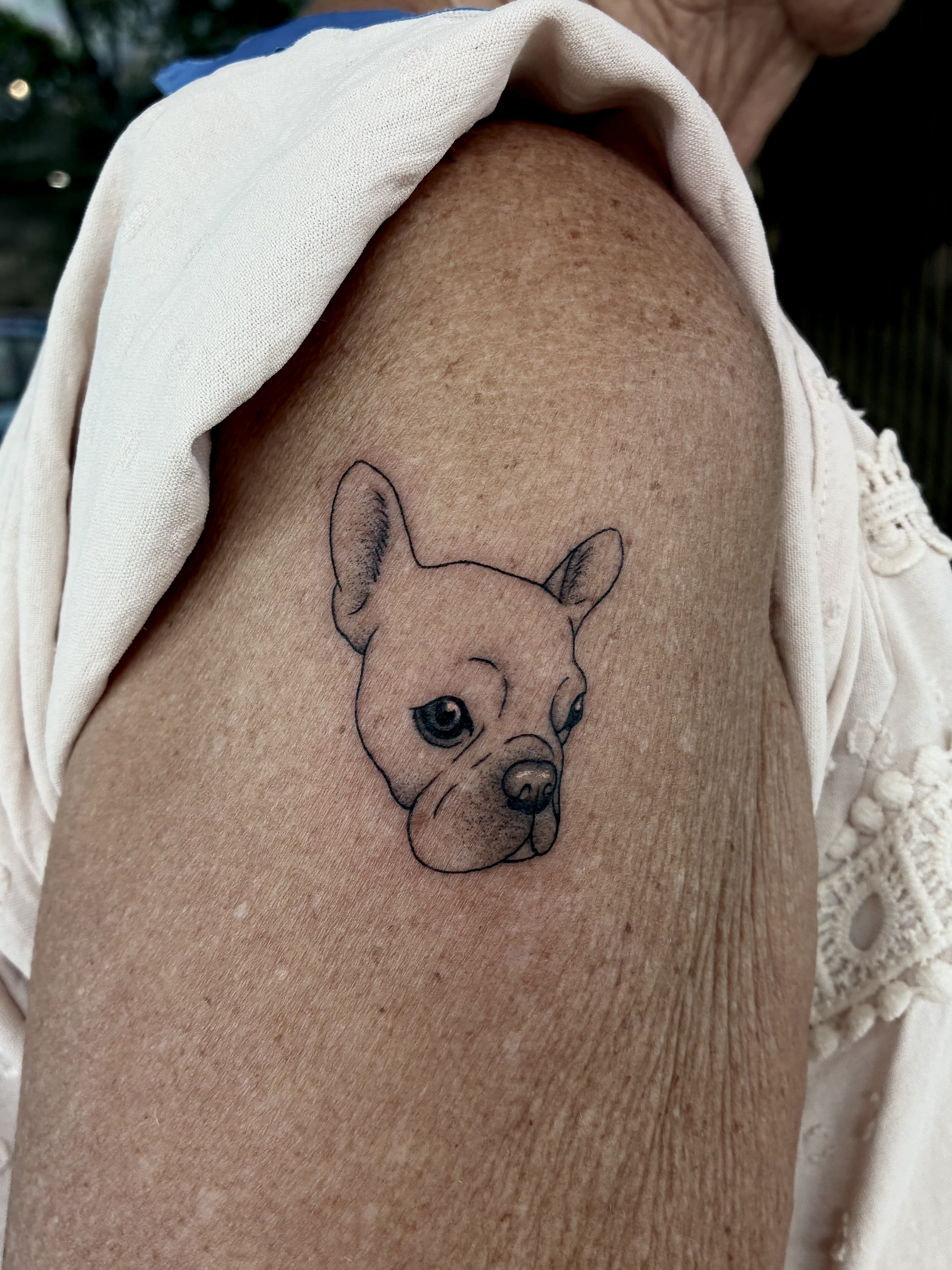 Lily tattoo work at Beach Park Tattoo