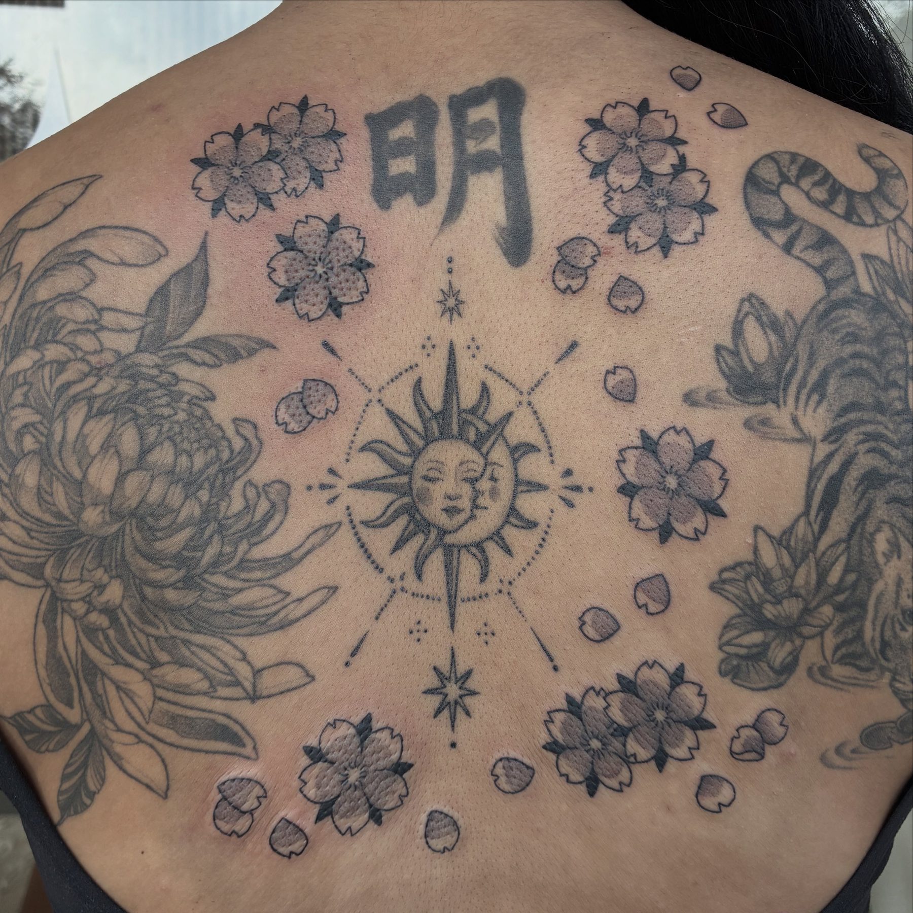 Lily tattoo work at Beach Park Tattoo Kailua